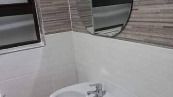 Hair dryer, towels, soap, toilet paper