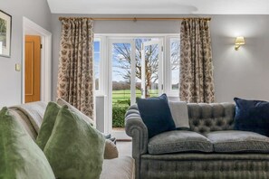 TV, fireplace, books, offices