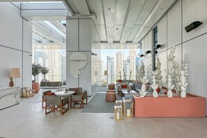 Lobby sitting area - Modern 2BR HighFloor Haven - Vida Marina (Dubai)