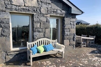 Detached cottage overlooking lake in Connemara