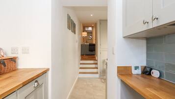 Fridge, electric kettle, toaster, cookware/dishes/utensils