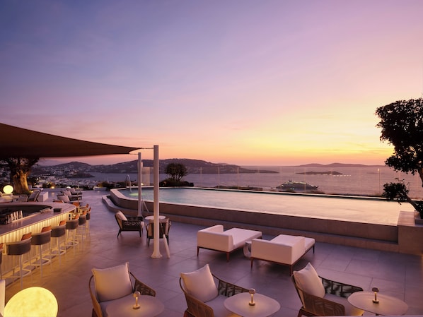Seasonal outdoor pool, pool umbrellas, pool loungers