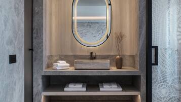 Shower, rainfall showerhead, designer toiletries, hair dryer