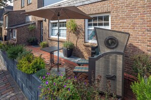 Outdoor dining - Willkommen in Unserer Komfortablen Ferienwohnung im Herzen von Norderney! Diese (Norderney)