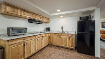 Fridge, microwave, stovetop, coffee/tea maker