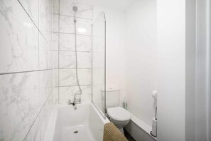 Shower, hair dryer, shampoo