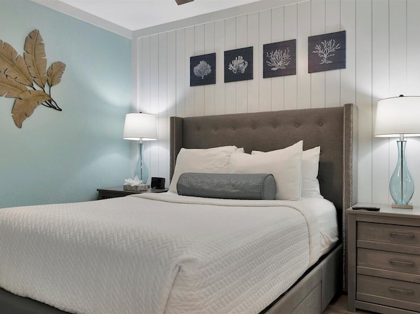 Slip into peaceful slumber in your coastal-inspired bedroom, where crisp linens and soothing sea tones create the perfect retreat after a day of adventure.