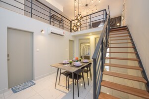 Executive Apartment | Living area | Flat-screen TV