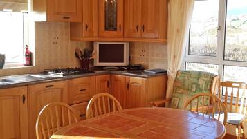 Microwave, dishwasher, highchair, cookware/dishes/utensils