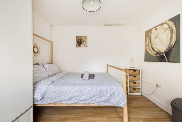1 bedroom, desk, iron/ironing board, travel crib