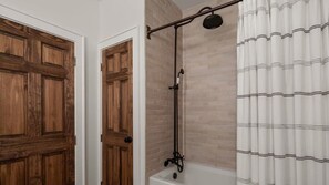 Shower, hair dryer, towels, shampoo