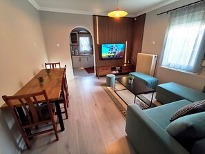 Family House | Living area | 43-inch LED TV with cable channels, Netflix, streaming services