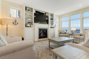 TV, fireplace, books