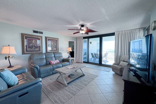Spacious Living Area with Reclining Furniture and Smart TV, 3rd Floor
