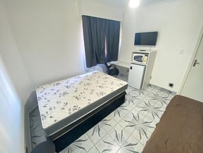 1 quarto, ferros/tábuas de passar roupa, acesso à internet