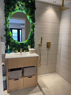 Shower, hair dryer, towels, soap
