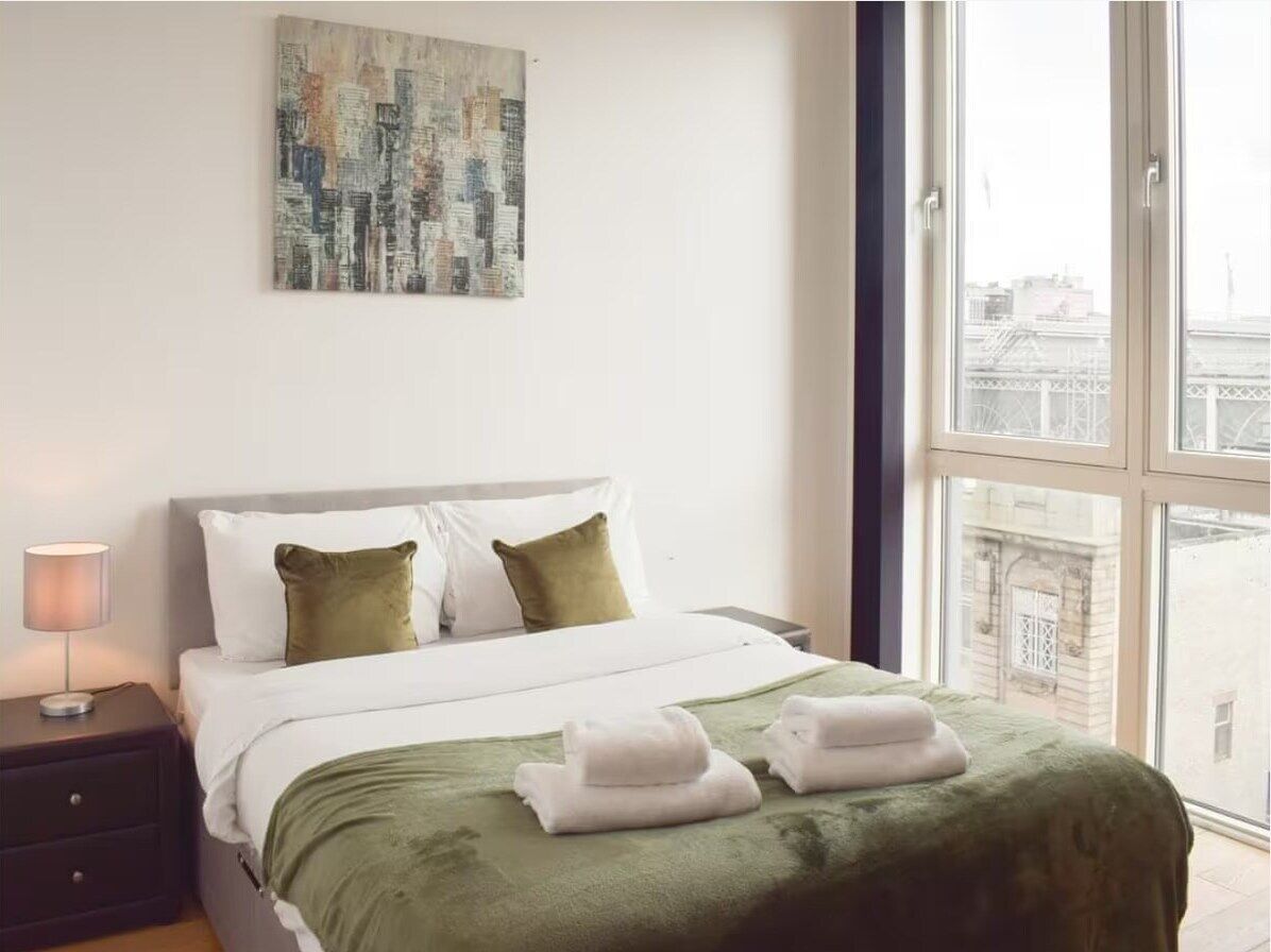 2 dormitorios, tabla de planchar con plancha, wifi gratis y ropa de cama