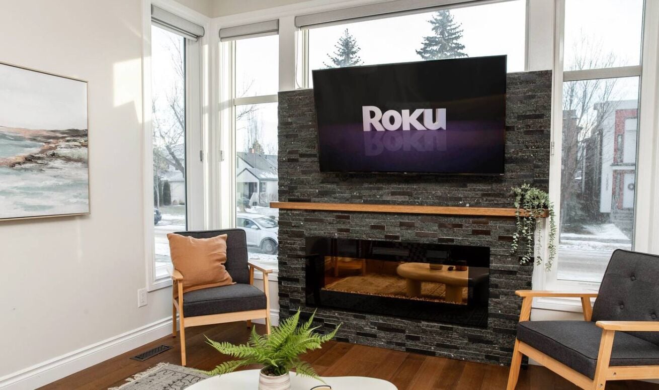 Smart TV, fireplace, books, offices
