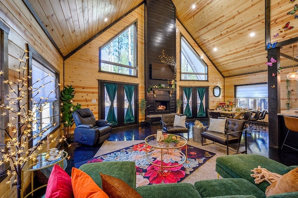 Settle in for a cozy movie night or relax in this welcoming living room made for downtime.