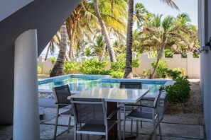 Outdoor dining - Stunning Oceanfront Apartment with Private Pool, Kayaks & Breathtaking Views! (San Pedro)