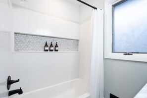 Hair dryer, towels, soap, shampoo