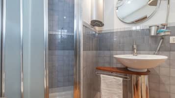 Shower, jetted tub, hair dryer, bidet