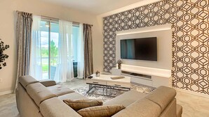 Living area - Last Minute Disney Getaway! Luxury Condo with Private Balcony. Book Now! #88095 (Orlando)