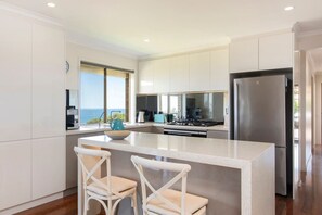Fridge, coffee/tea maker, cookware/dishes/utensils