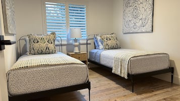 3 bedrooms, desk, iron/ironing board, travel crib