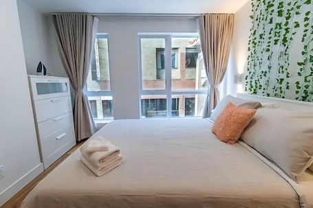 Blackout drapes, iron/ironing board, free WiFi, bed sheets