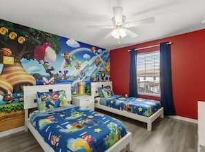 A bedroom with two beds, a ceiling fan, a mural, and a window with curtains. - Last Minute Disney Getaway! Townhouse with Private Pool. Book Now! #92399 (Orlando)