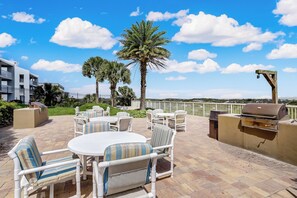 Outdoor dining - 104 Amelia by the Sea, Two Bedroom Ground Floor Oceanfront with Pool (Fernandina Beach)
