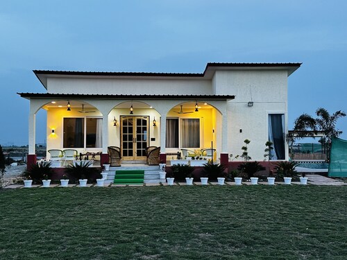 M H Farm A premium Farmhouse 3BHK villa with Pool river view