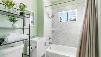 Hair dryer, towels, soap, shampoo