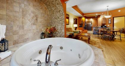 Ideally located condo with fireplace, jetted tub, on-site golf, & central AC