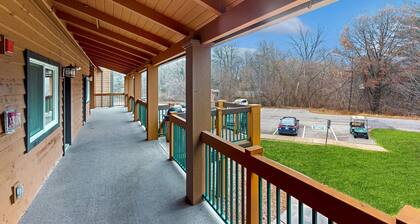 Golf-adjacent condo with balcony, arcade, & playground
