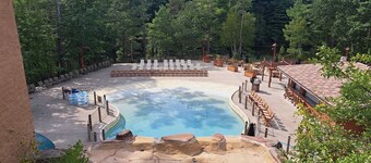 Golf-adjacent condo with balcony & arcade