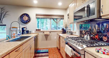 Coastal acreage with wrap-around deck & furnished patio - great location