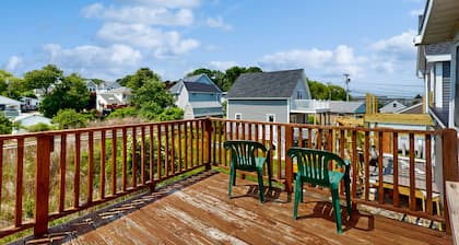 Sun-filled & serene coastal retreat with deck & stunning ocean views - near golf