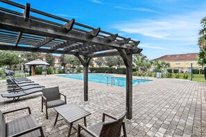 Pool - 2-story snowbird-friendly townhouse near Disney with patio, streaming, W/D, AC (Kissimmee)