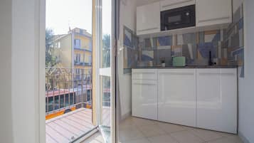 Camera Deluxe con letto matrimoniale o 2 letti singoli | Cucina privata | Frigorifero, piano cottura, macchina per caffè espresso