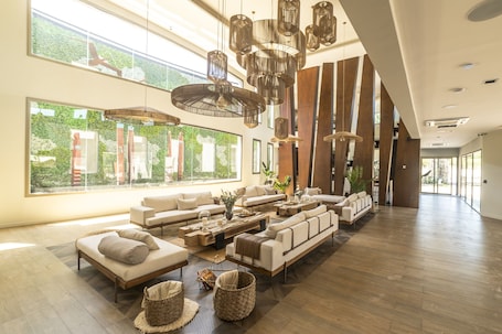 TV de tela plana. Domingo Hotel Design