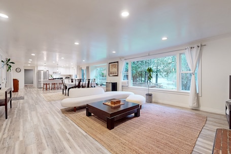 TV, fireplace. Lakefront home with private dock, lake views, firepit, & wood stove