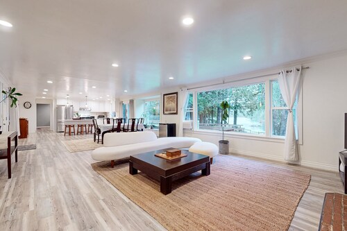 Lakefront home with private dock, lake views, firepit, & wood stove