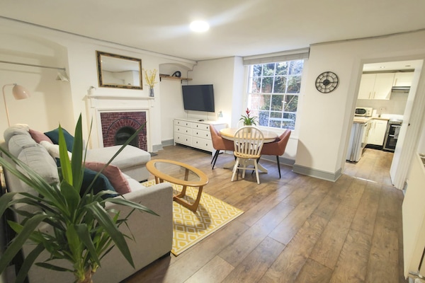 Living room with dining table & seating x4, 50" TV, double sofa bed, LED Lights