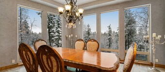 Whimsical acreage with high-end finishes, old-world character, air hockey, & W/D