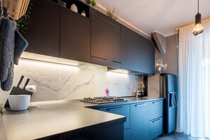 Private kitchen - Comfortable apartment located on the second floor of a building without lift.In 60 m2 of space it comfortably accommodates two people, with one bedroom.There are internal stairs that are NOT accessible.Small building with a green space and ample free par (Parma)