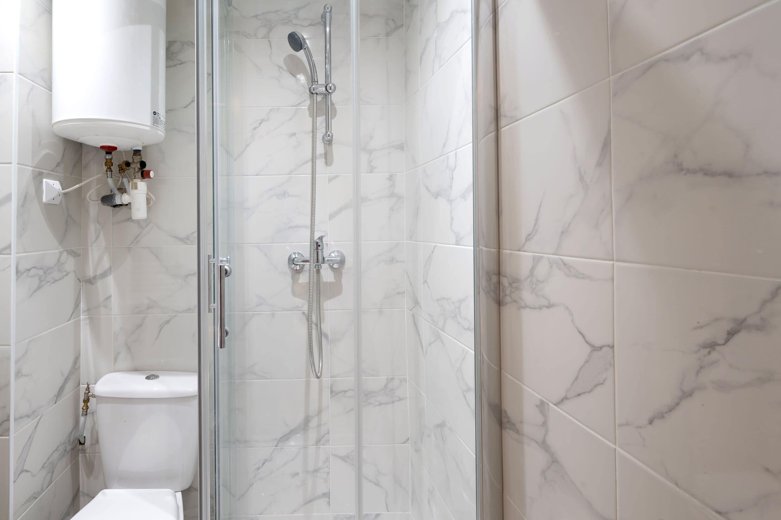 Shower, free toiletries, hair dryer, towels