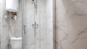 Shower, free toiletries, hair dryer, towels