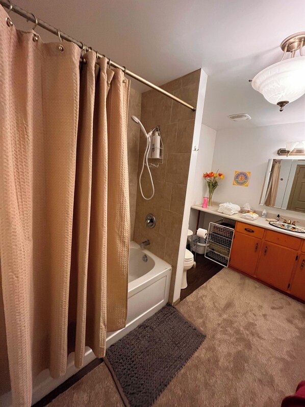 Hair dryer, towels, soap, shampoo